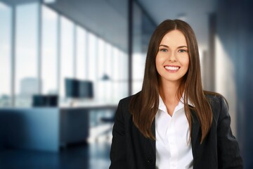 Fototapeta premium Happy young business woman employee posing