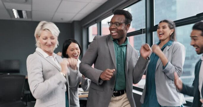 Business people, group and dance in office for celebration, success and motivation of bonus. Corporate team building, happy black man and dancing with friends for solidarity, fun or support diversity