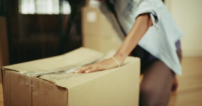 Woman hands, packing box and tape for moving with mortgage and new house, property and real estate. Female person seal boxes, relocation with homeowner and investment with move, cardboard or tape gun