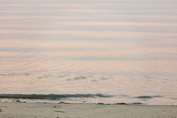 Close up of sea water on seaside. Coastline.