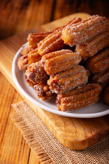Churros. Fried wheat flour dough, a very popular sweet snack in Spain, Mexico and other countries where it is customary to eat them for breakfast or snack accompanied by hot chocolate or coffee.