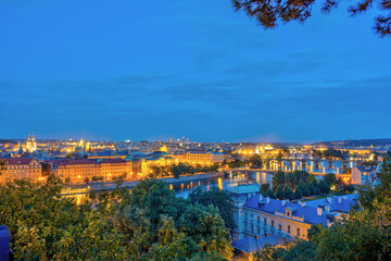 Fototapeta na wymiar View over Prague with the river Vltava and the Charles Bridge at night