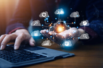 man use Laptop with cloud computing diagram show on hand. Cloud technology. Data storage. Networking and internet service concept.