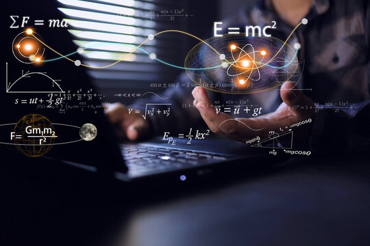 student holding physics and math equations it floating from the laptop  computer screen, representing the learning teaching or scientific theory of Albert Einstein and Sir Isaac Newton.