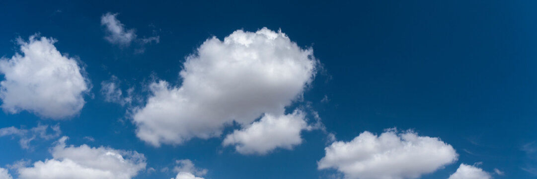 clouds in the blue sky. Banner