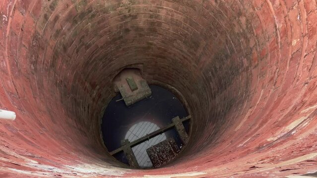 Pond at Historical Fort of Agra, India, Panning view of the high sandstone walls - a UNESCO world heritage site.