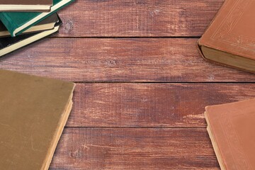 Old retro reading book on wooden desk