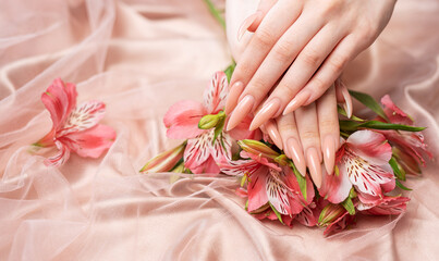 Elegant pastel pink natural manicure.
