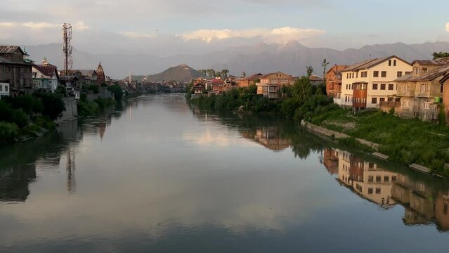 Water fresh in river Jhelum houses in Srinagar downtown area an old city.