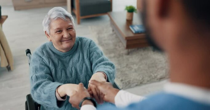 Wheelchair, happy or old woman holding hands with nurse for support or empathy for healthcare service. Smile, trust or sick elderly patient with a disability in nursing consultation with caregiver