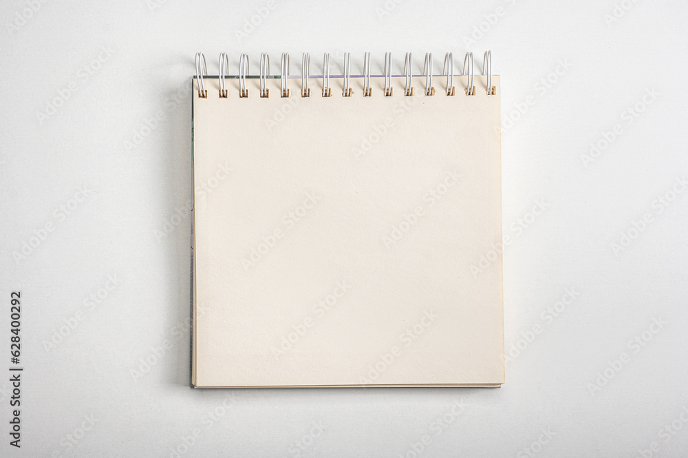 Aufkleber mockup notebook. spiral notebook from top view with empty white space, square notepad with blank she