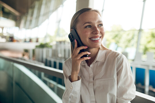 Blonde young business woman having a phone call
