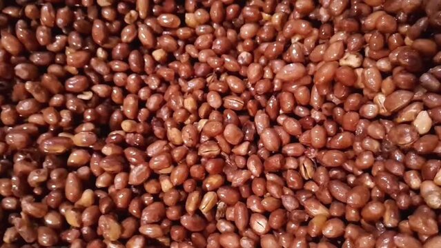 Vertical footage, close up of peanuts