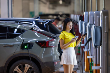 EV charging an electric car.Power supply for electric car charging. Socket for electric car battery...