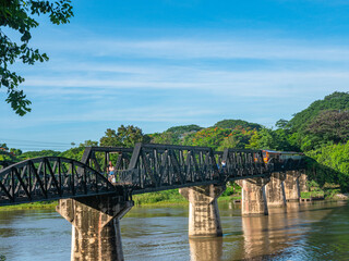 .The train is passing through the Death Railway Bridge over the River Kwai in Kanchanaburi. .During World War Two Japan constructed railway from Thailand to Burma This is now know the Death Railway..