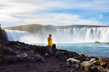 Godafoss waterfall in Iceland on summer. Majestic road trip landmark. Travel destination.