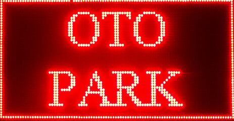 Neon sign with Oto Park