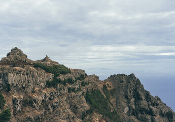 Fototapeta na wymiar View of rocky steep volcanic mountains and sea on atlantic island