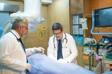 Doctors Performing Surgical Operation in Bright Modern Operating Room