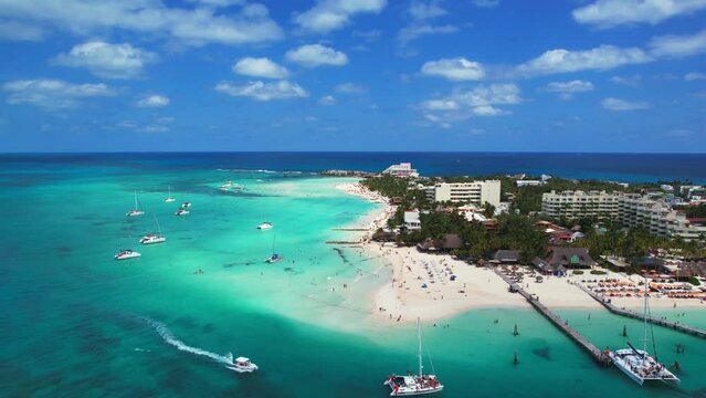 Aerial Drone Flyover Clear Blue Water And Resort In Mexico Playa Norte, Isla Mujeres, 4K