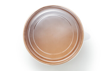 Disposable kraft paper bowl with plastic lid isolated on white background. Top view.