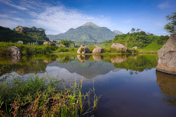 Fototapeta na wymiar Morning view of mountain in tropical country. Mount Penanggungan