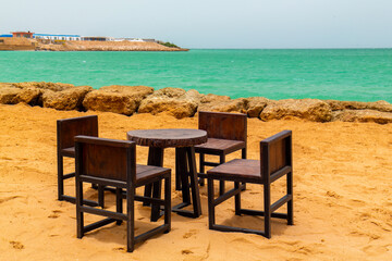 Wooden table at the edge of the Dakhla peninsula