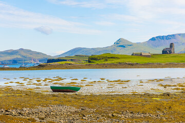 The beautiful and remote Isle of Canna in Summer time with views across the bay and to the larger...
