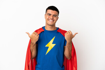 Super Hero over isolated white background with thumbs up gesture and smiling