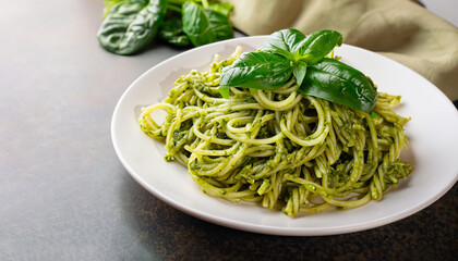pasta with spinach pesto sauce, green basil