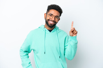 Young Brazilian man isolated on white background showing and lifting a finger in sign of the best