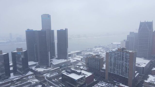 Modern office buildings in downtown Detroit, aerial drone view. Foggy day