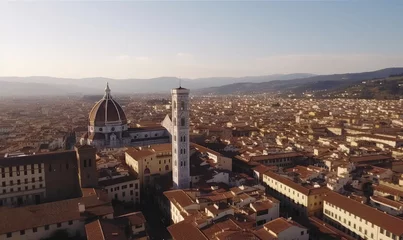 Selbstklebende Fototapeten Aerial view of the town of Florence, in Italy, on a clear sunny day © CostantediHubble