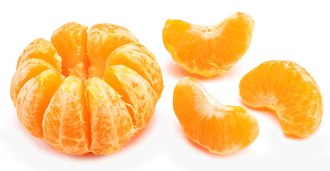 Ripe mandarin fruits and peeled mandarin slices on white background.