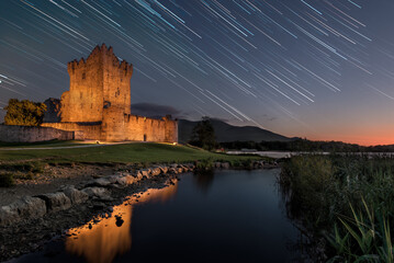 the old Ross castle at night with star trails