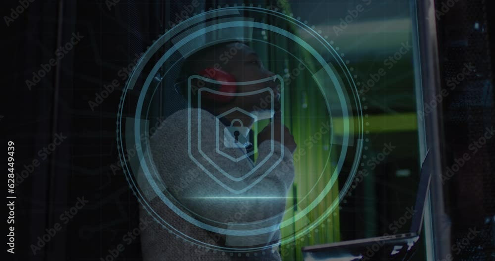 Poster animation of cyber security text and padlock in circle, african american engineer checking data room
