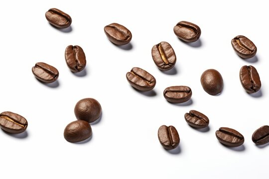 Pile coffee beans isolated on white background and top view © Denis