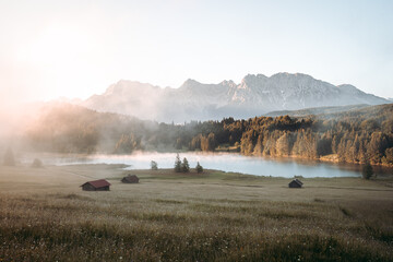 Amazing foggy Sunrise at Geroldsee, also Wagenbruchsee, Bavaria, Germany Europe
