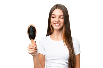 Teenager caucasian girl with hair comb over isolated background with happy expression
