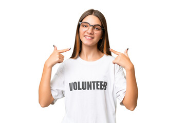 Teenager volunteer caucasian girl over isolated background giving a thumbs up gesture