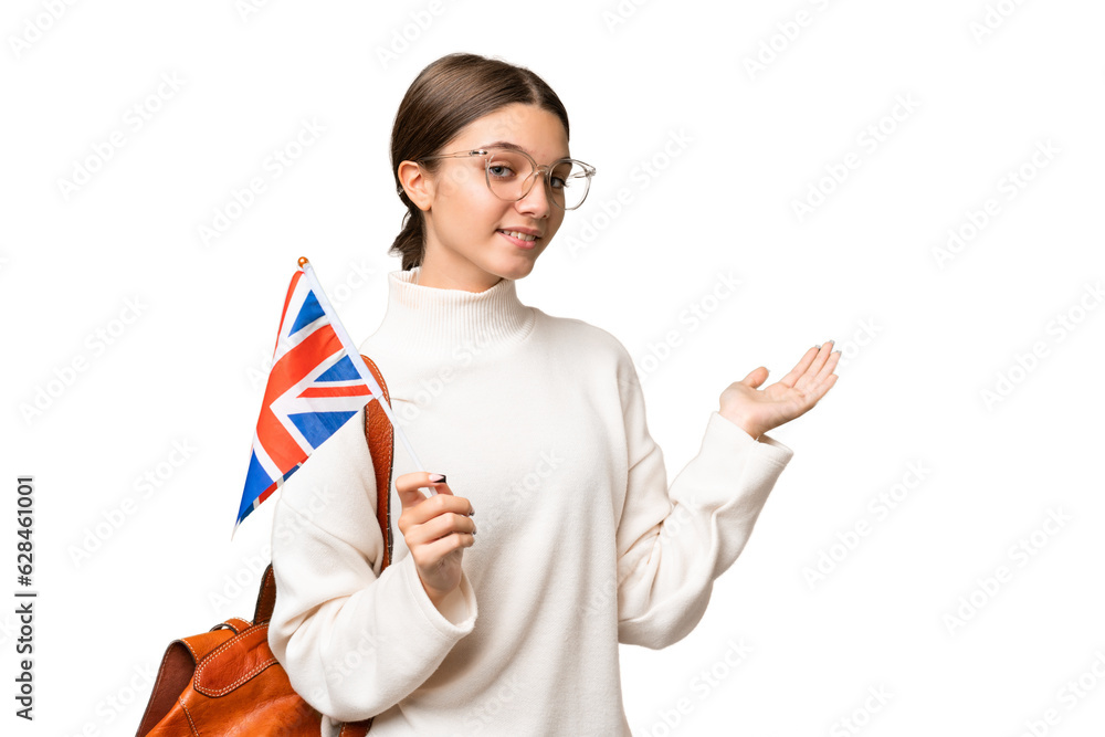 Sticker Teenager student caucasian girl holding an United Kingdom flag over isolated background extending hands to the side for inviting to come