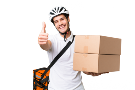 Delivery man wearing a helmet bike over isolated background with thumbs up because something good has happened
