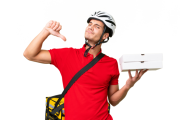 Pizza delivery man with work uniform picking up pizza boxes over isolated background proud and self-satisfied