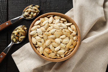 Cooking ingredients for fall season - pumpkin seeds, pumpkin