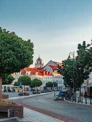 Fototapeta na wymiar Vilnius, Lithuania - 07 15 2023: Didžioji gatve. Beautiful street in the center of Vilnius near the Town Hall Square