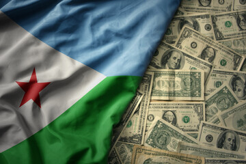 colorful waving national flag of djibouti on a american dollar money background. finance concept