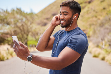 Fitness, happy man or runner with music on mobile app online in training, workout or exercise on road. Headphones, radio audio or healthy athlete listening or streaming podcast to start running