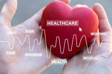 Doctor pushing button heart pulse healthcare on virtual panel in medicine closeup. - 628471831