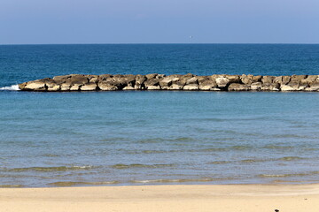 Fototapeta na wymiar Sandy beach on the Mediterranean Sea