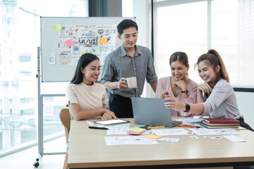 Asian office team brainstorming, plan for solution idea, Group of asia creative teamwork and woman leader at business meeting for developing mobile phone app, ux, ui start up, small business